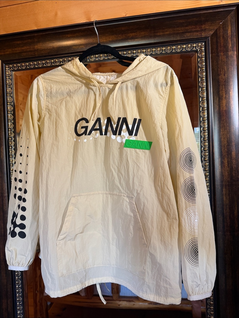 Ganni Cream Hooded Windbreaker with Black Graphics & Green Patch